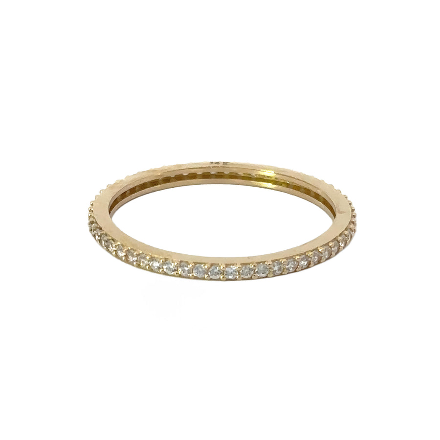 Close-up of 14k gold ring with sparkling cubic zirconia stones