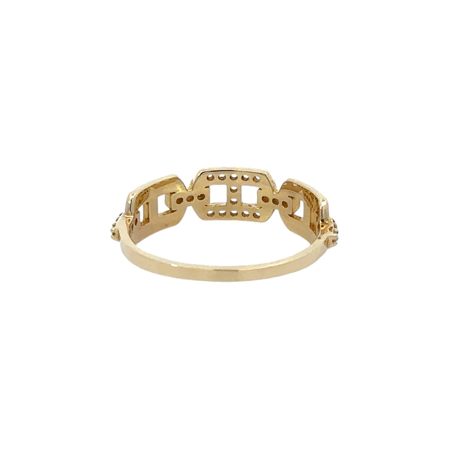 Woman wearing 14k gold ring with radiant cubic zirconia