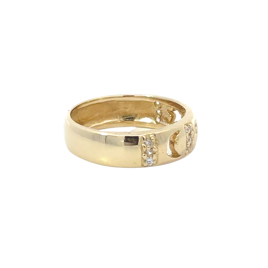 Side view of the ring showing its dainty band and celestial symbols