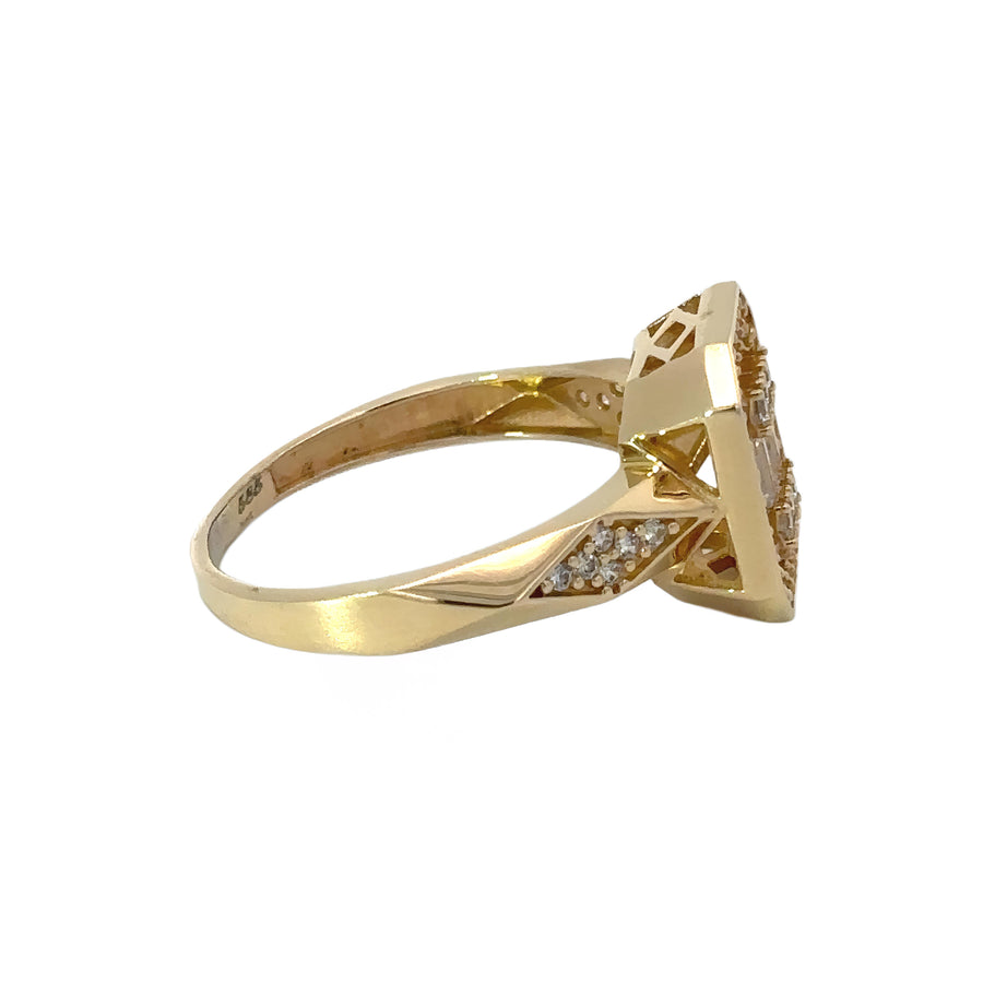 Woman wearing 14k gold ring with romb CZ centerpiece size 7