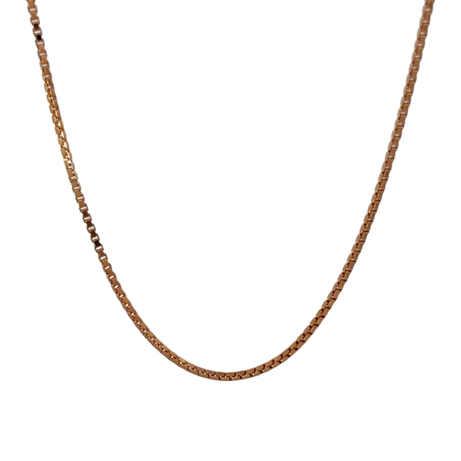 16-inch gold necklace styled for both men and women