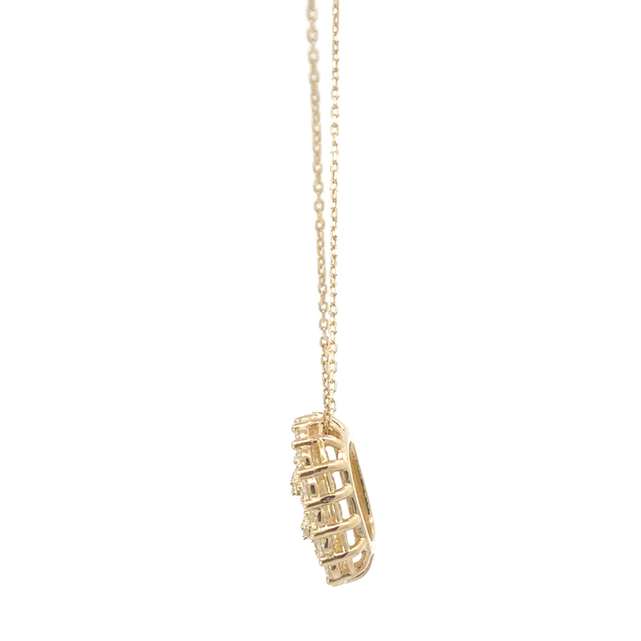 14k gold ring featuring square pendant design, size 7