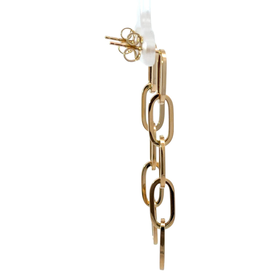 Woman wearing lightweight 14k gold 5-link earrings
