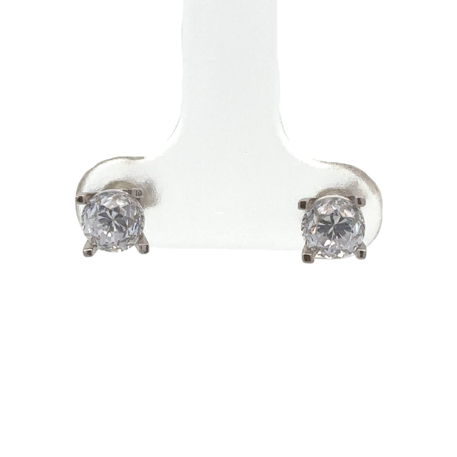14k gold small CZ stud earrings on white background