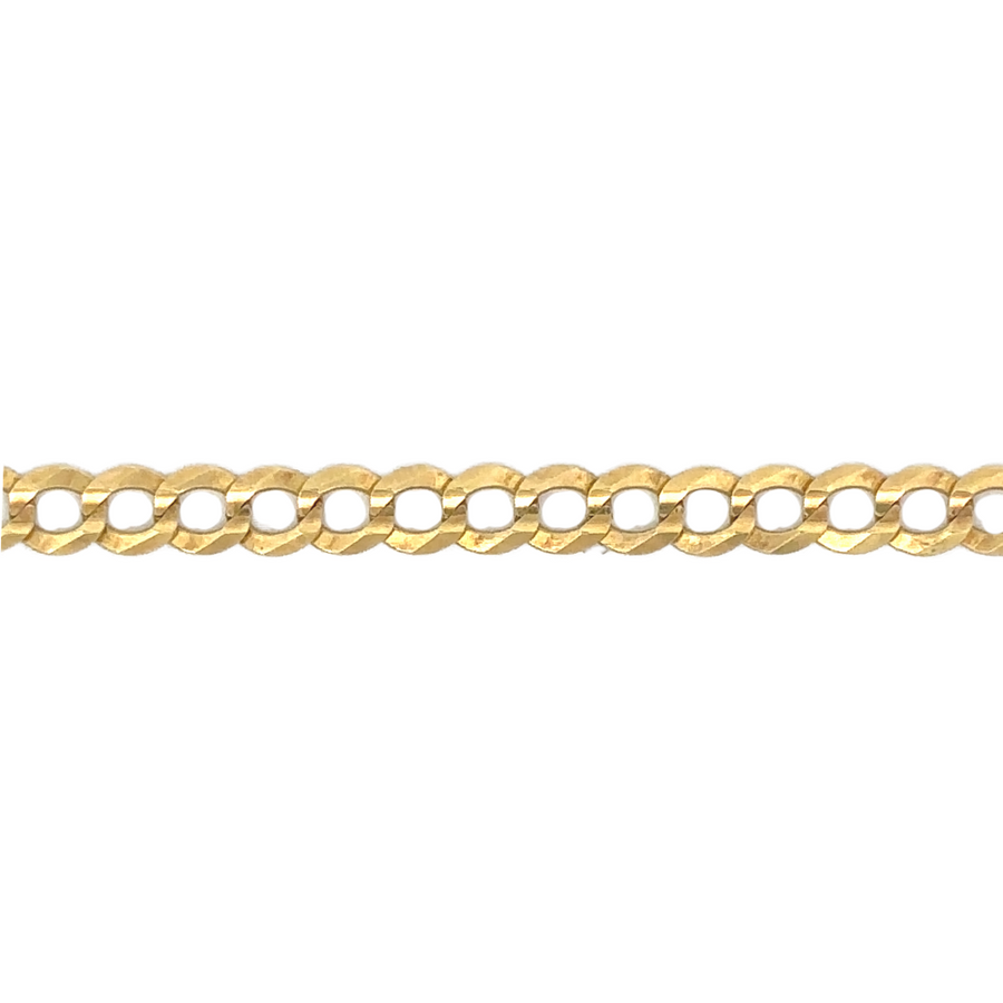 Side view of 14k gold small Cuban link chain with sleek and polished look