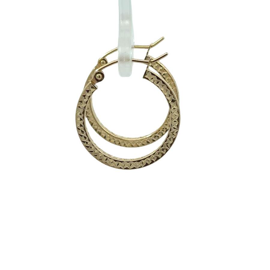 Small faceted earrings crafted from 14k gold