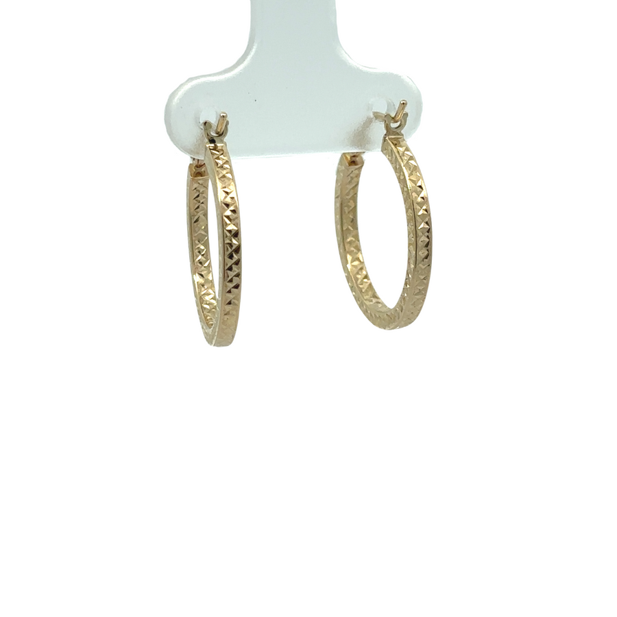 Elegant 14k gold earrings with faceted design
