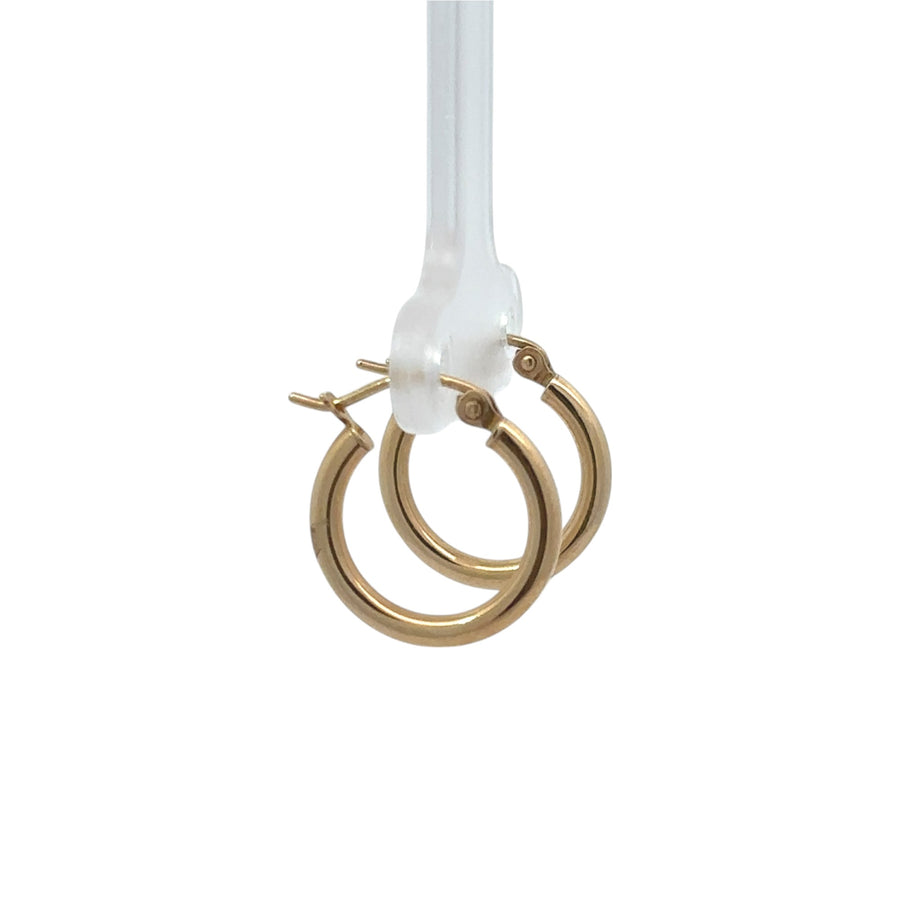 Lightweight 14k gold hoop earrings with smooth finish