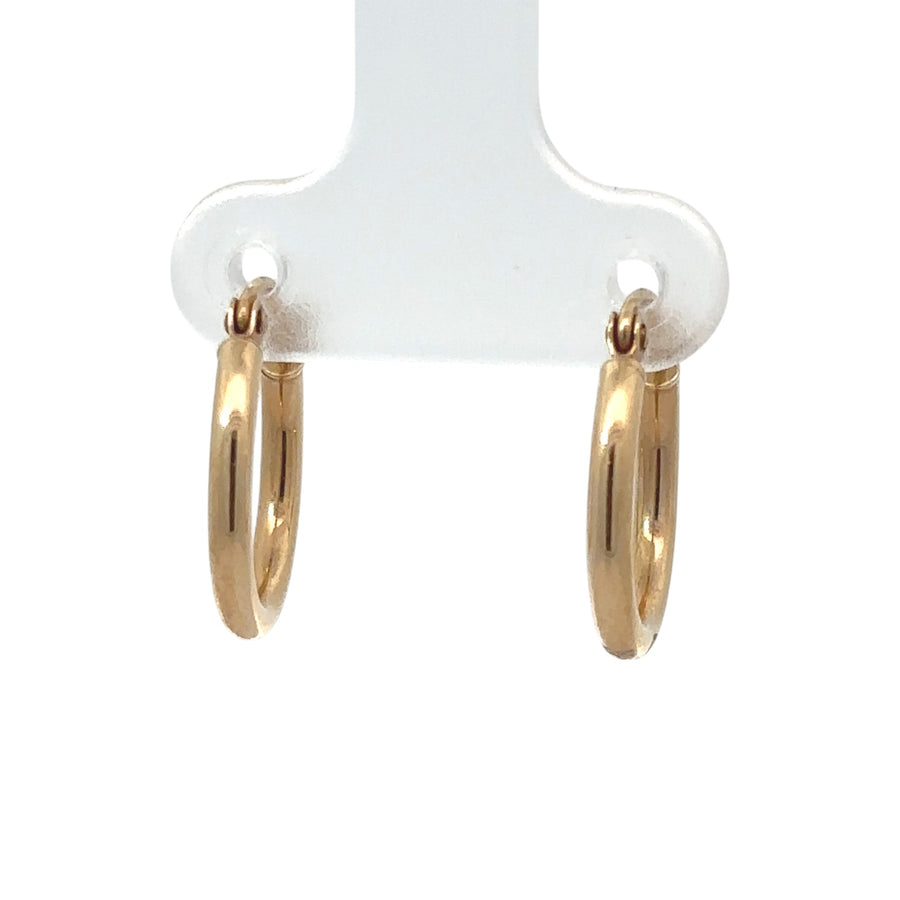 14k gold small solid hoop earrings on white background