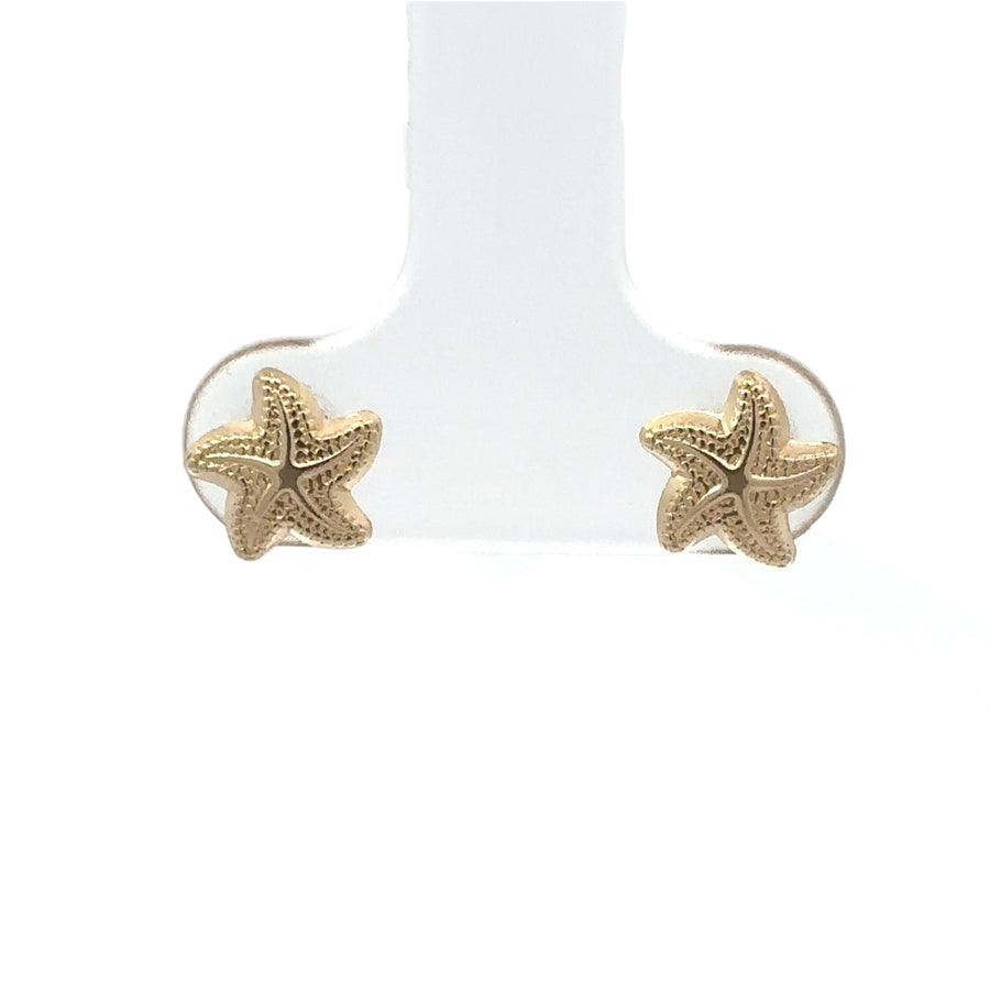 14k gold starfish stud earrings displayed on white