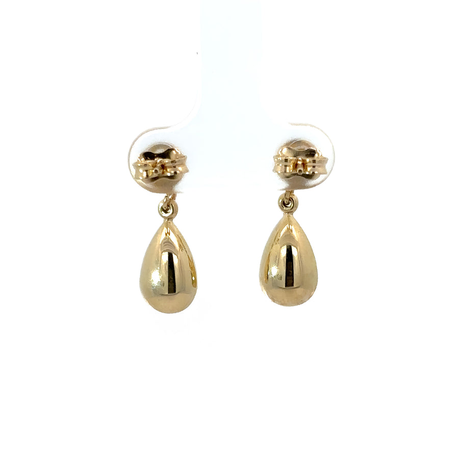 Side view of solid gold drop earrings crafted in 14k gold