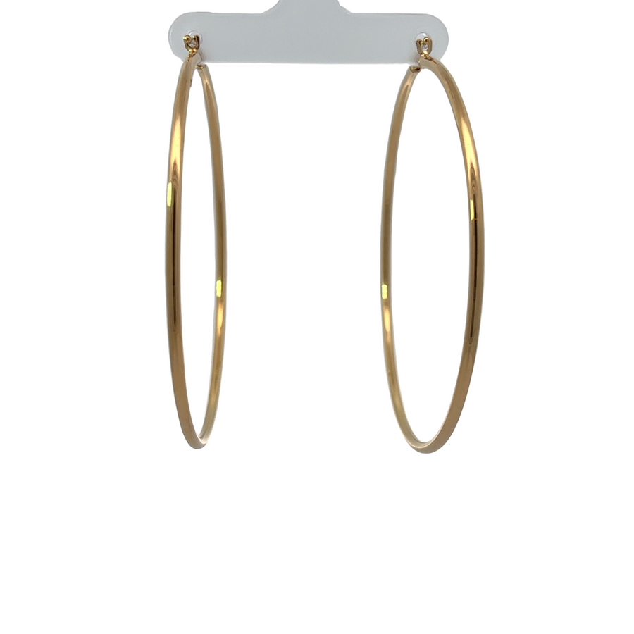 Minimalist 14k gold earring with a polished finish