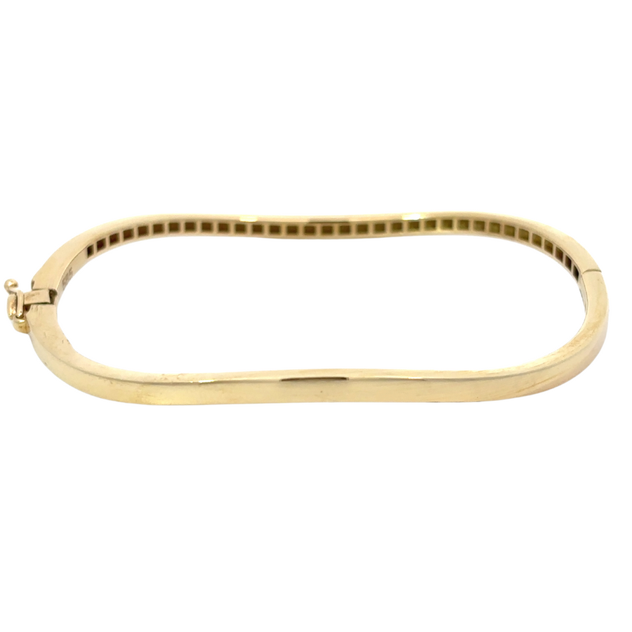 Minimalist 14k gold bangle for women with 6 cm diameter