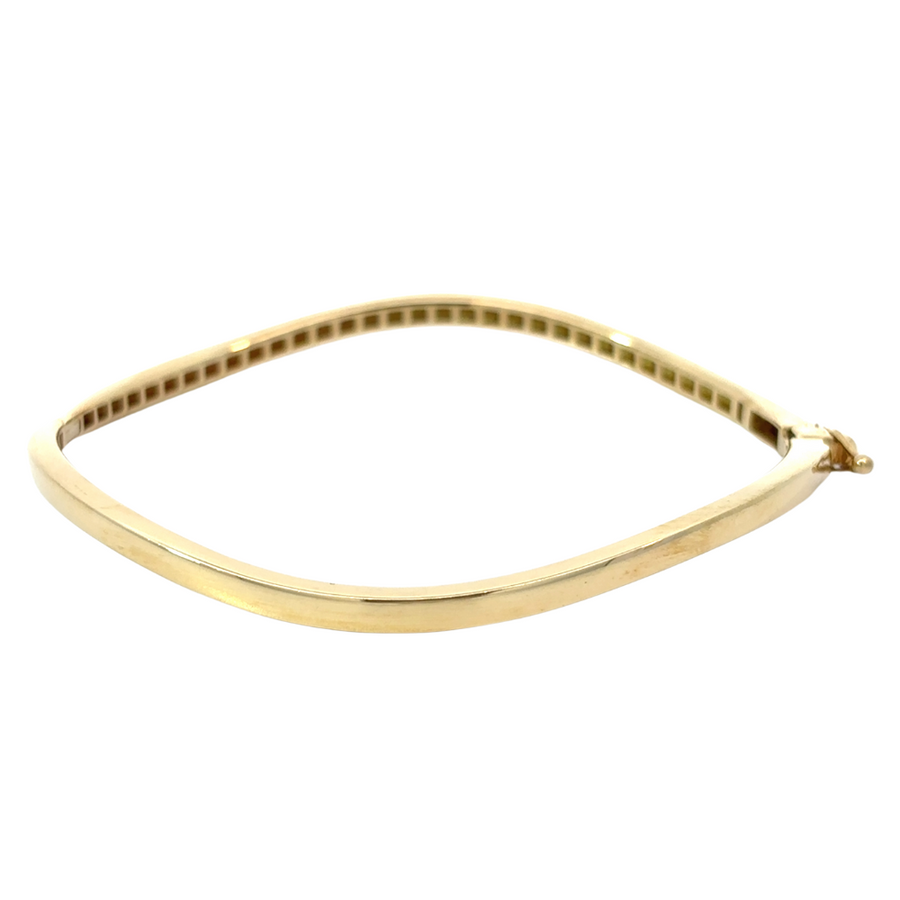 14k gold solid wave fine bangle with elegant curved design