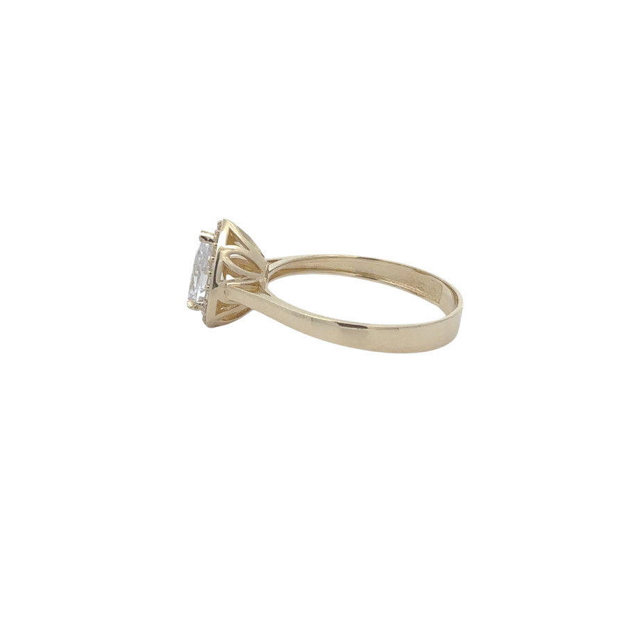 Close-up of solitaire cubic zirconia stone in 14k gold ring