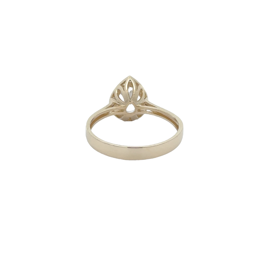 Elegant 14k gold ring featuring solitaire CZ in drop setting