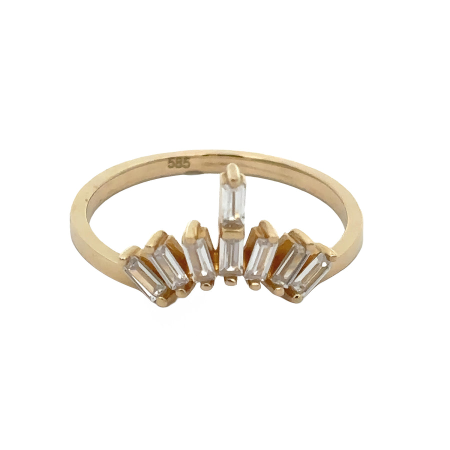 Close-up of 14k gold ring with solitaire diamond