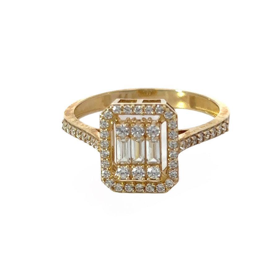 Close-up of 14k gold solitaire ring with single gemstone