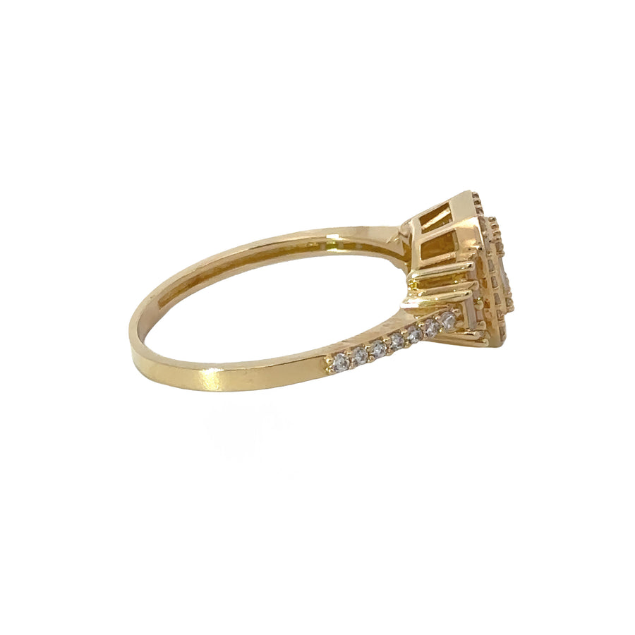 Side view of 14k gold solitaire ring with shining gemstone