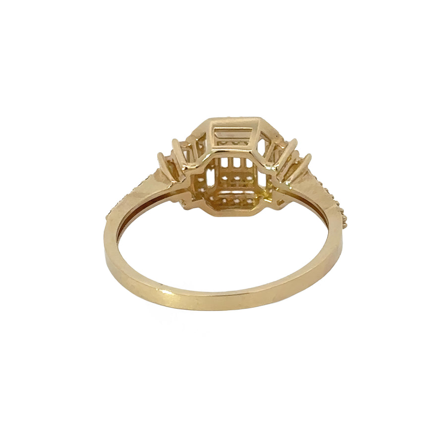 Woman’s hand wearing 14k gold solitaire ring size 7
