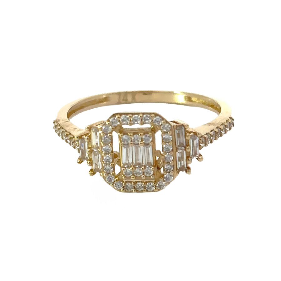 Close-up of 14k gold solitaire ring with single gemstone