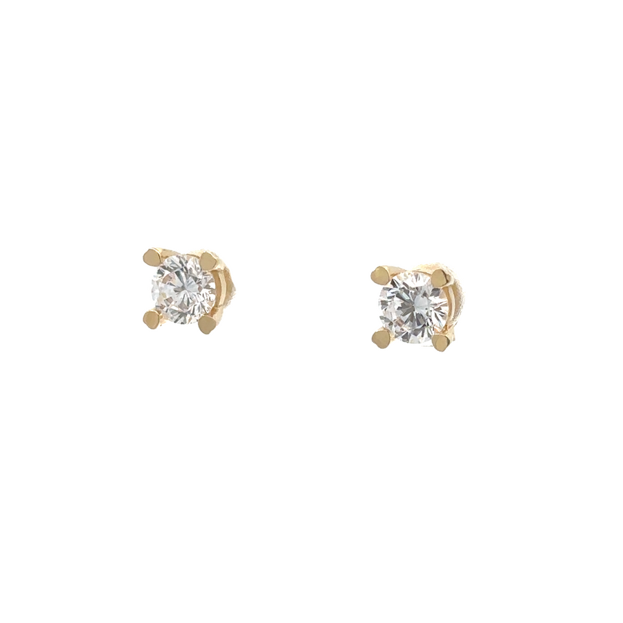 Woman wearing 14k gold square-inspired earrings and necklace
