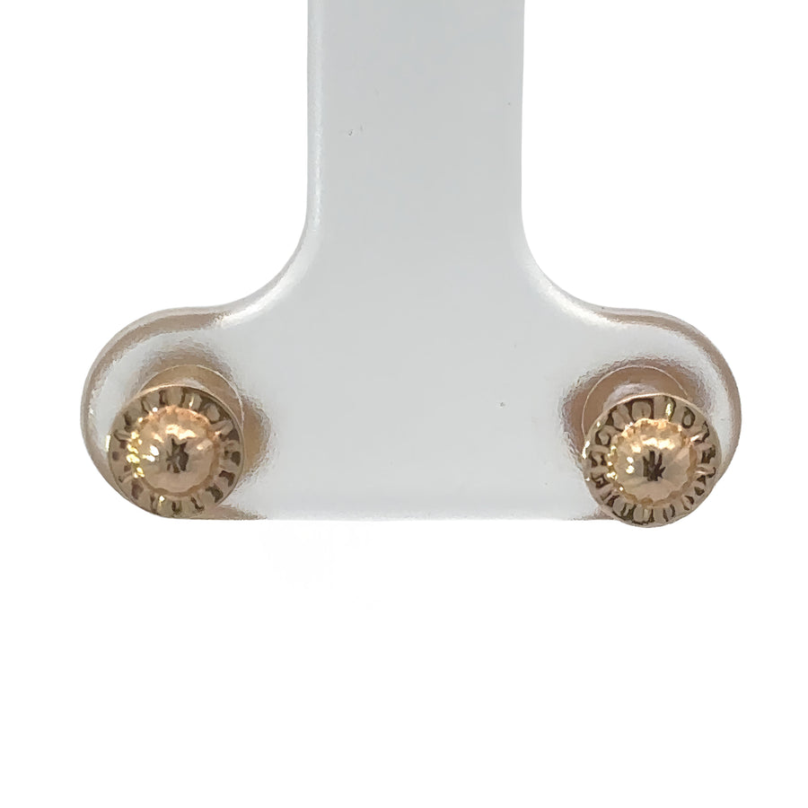 Pair of 14k gold heart stud earrings designed for babies