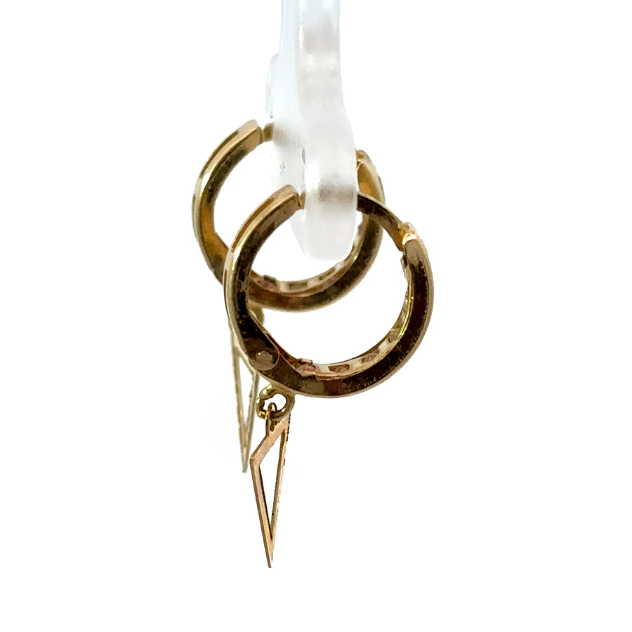 Minimalist triangle-shaped baby earrings in 14k gold