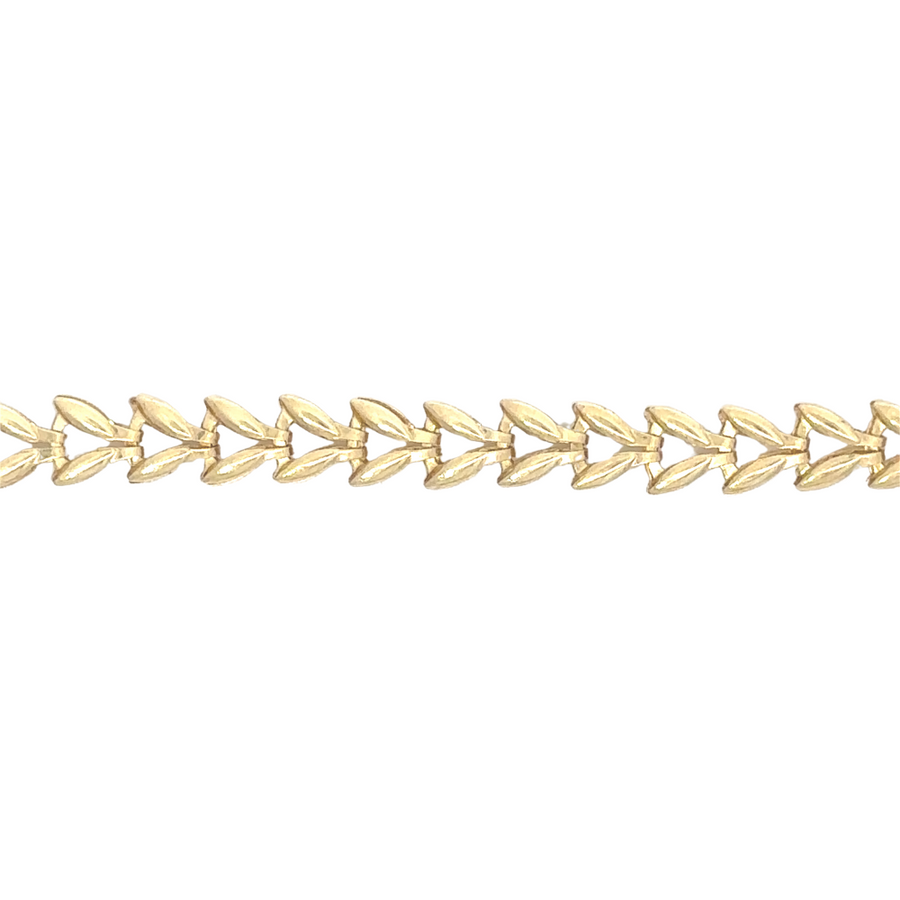 Elegant 14k gold bracelet worn on wrist, 24.5 cm size offering a comfortable fit