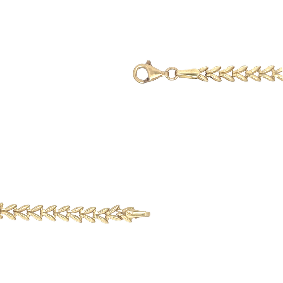 Timeless 14k gold bracelet with sleek, classic design