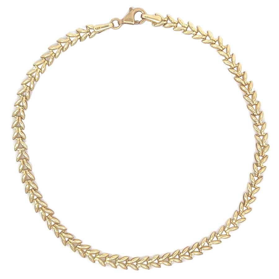 14k gold unisex bracelet with high-polish finish, showcasing timeless elegance