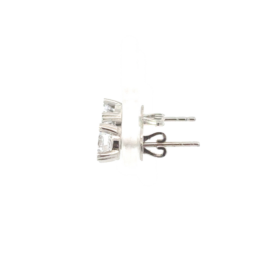 A detailed shot of the 14k gold WG earrings, adding sophistication to the overall jewelry set