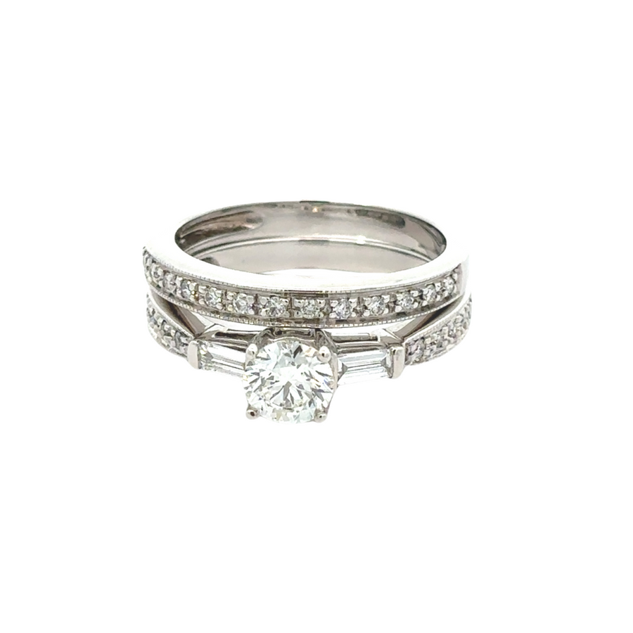 14k gold WG ring featuring a brilliant 1-carat center stone