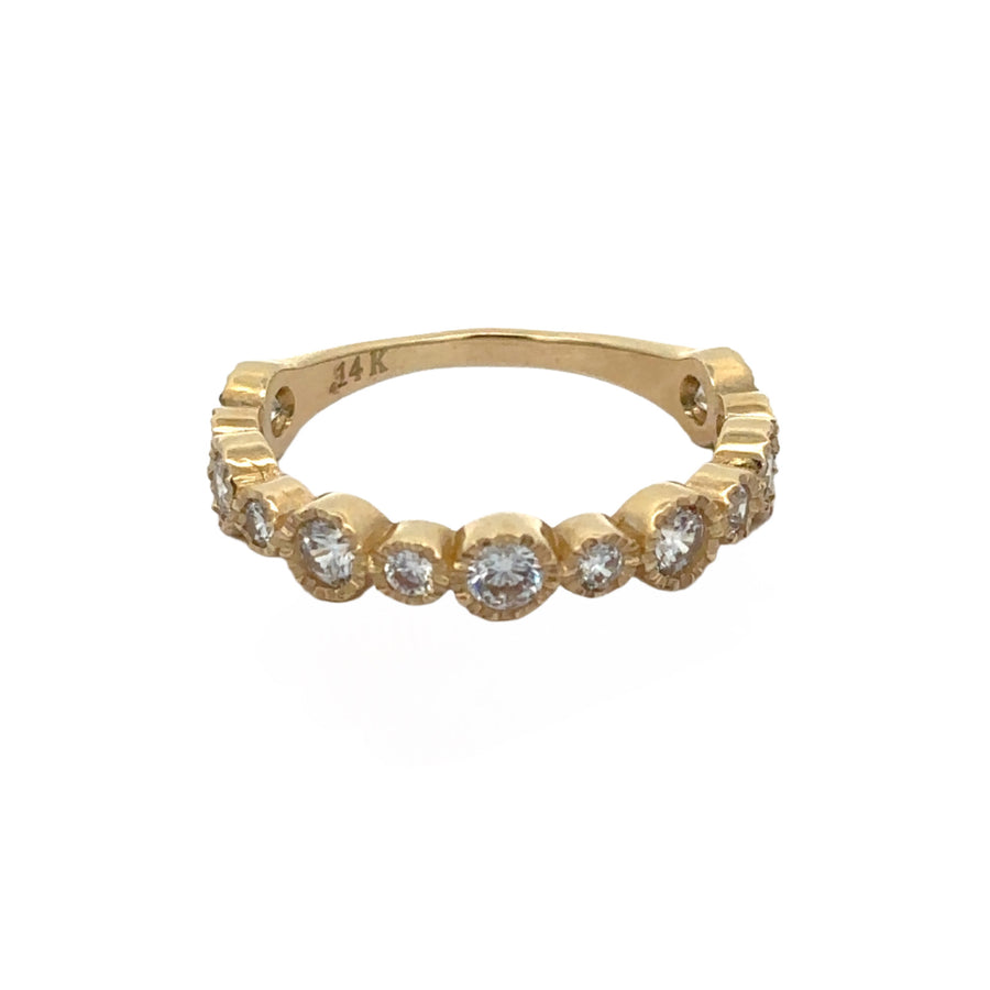 Close-up of sparkling CZ stones on 14k gold aro ring