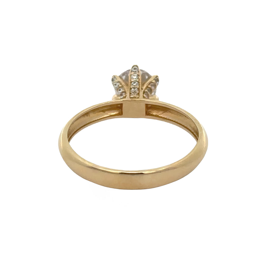 Side view of 14k gold ring featuring solitaire cubic zirconia