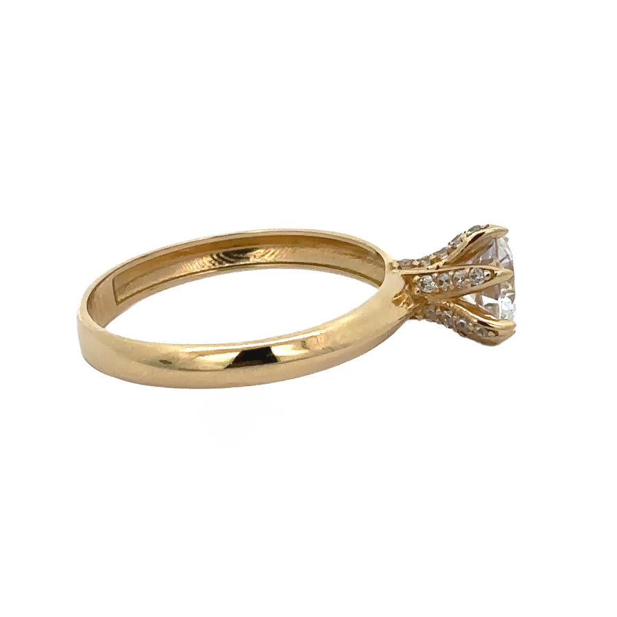 Woman’s hand wearing size 7 14k gold CZ solitaire ring