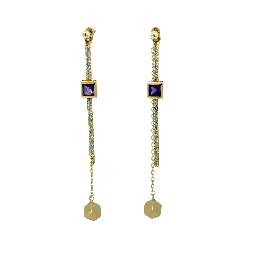 Close-up of elegant 14k gold hoop earrings on white background