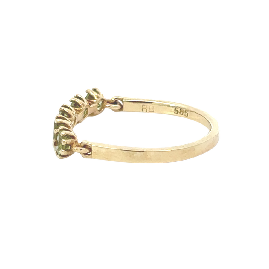 Ring displayed in an open jewelry box with soft lighting