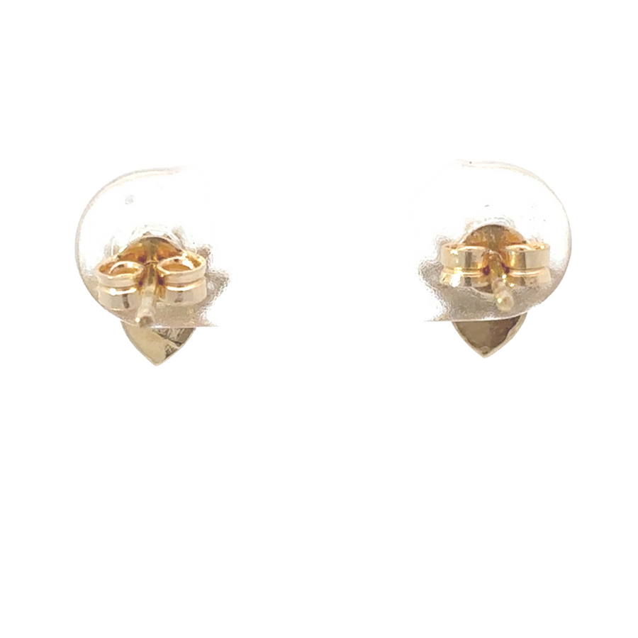 Model wearing 14k gold XS earrings with casual attire