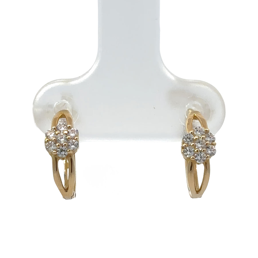 14k gold XS huggie earrings with floral design