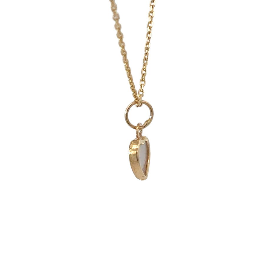 Tiny 14k gold heart charm for women and babies