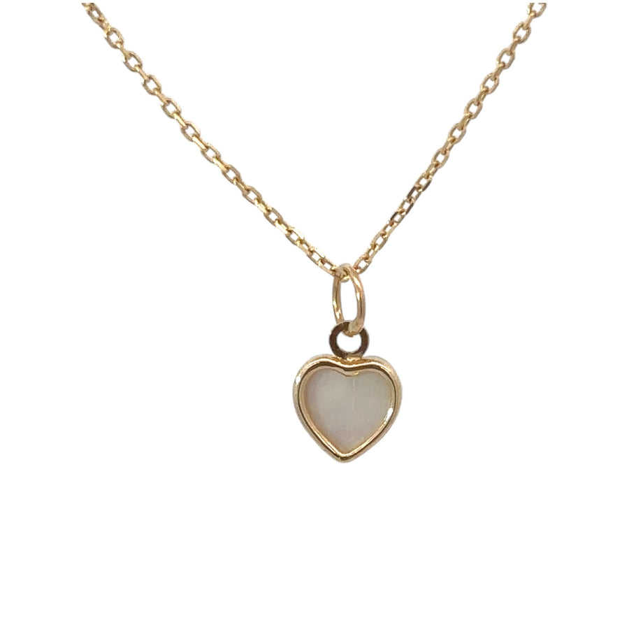 XS heart pendant in 14k gold on white background