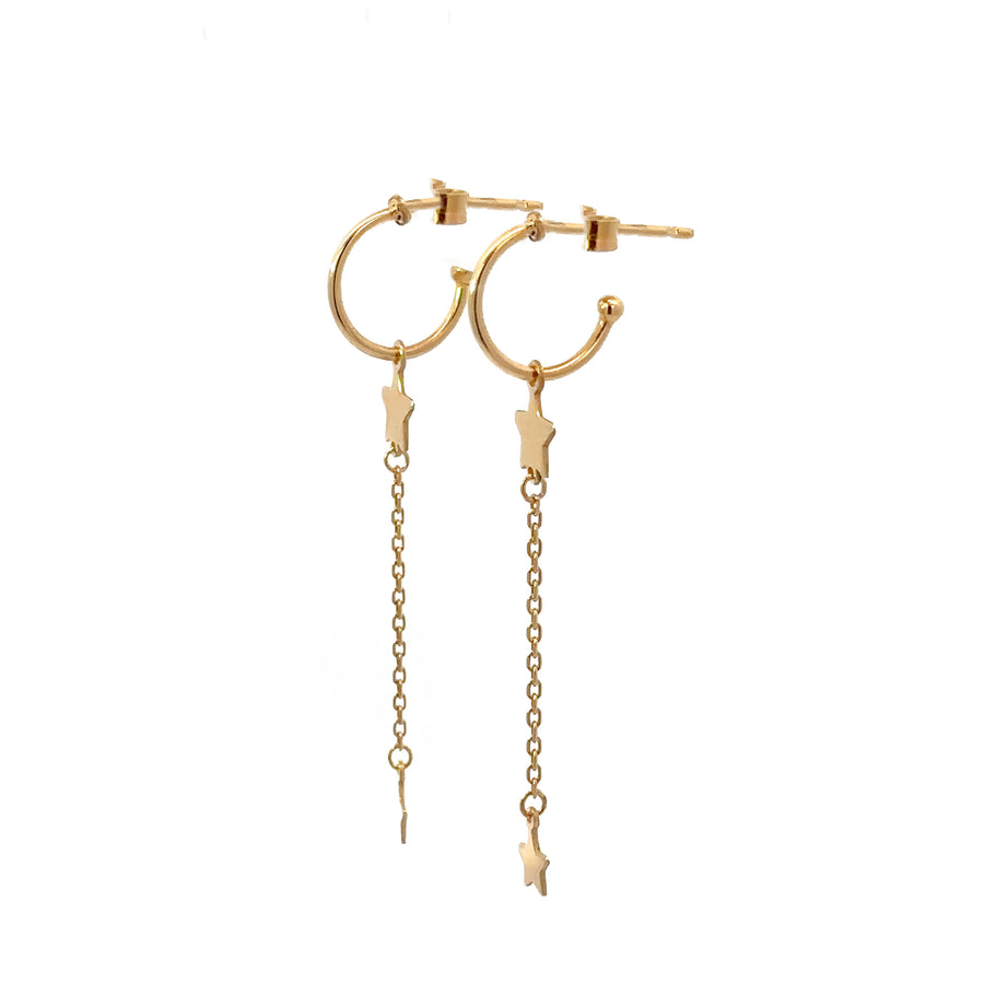 Dainty gold hoop earrings with dangling star accents