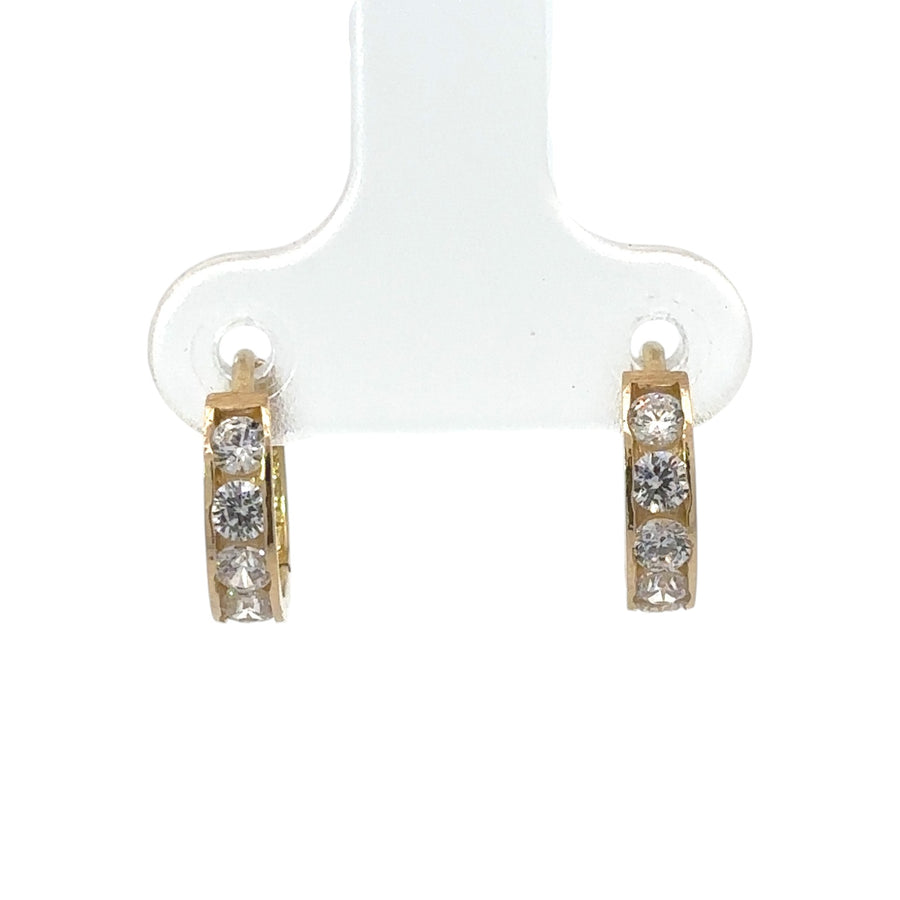 14k gold XS huggie earrings with cubic zirconia accents
