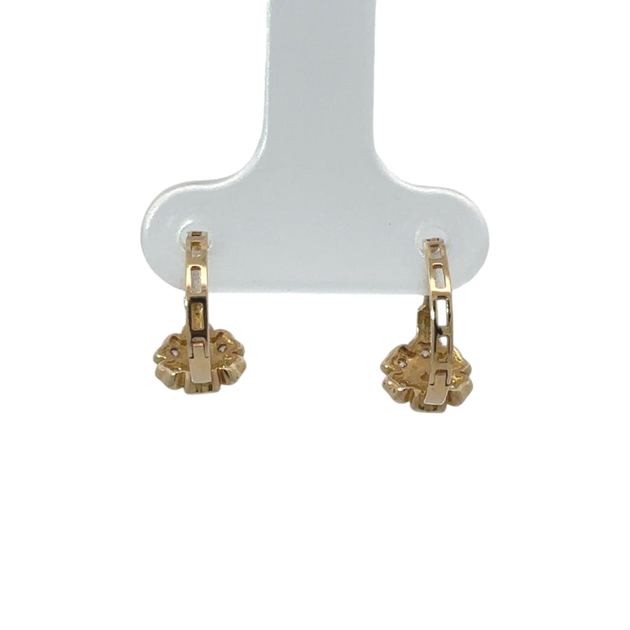 Petite flower motif on solid 14k gold baby earrings