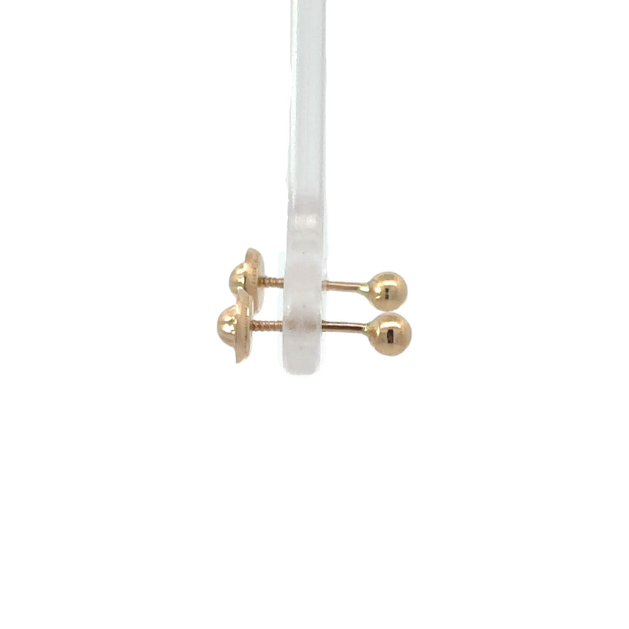 Minimalist 14k gold round stud earrings with polished finish