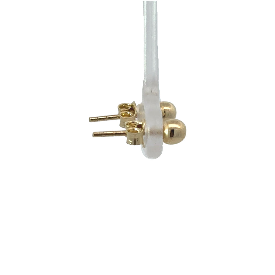 Minimalist 14k gold earrings with XS round design