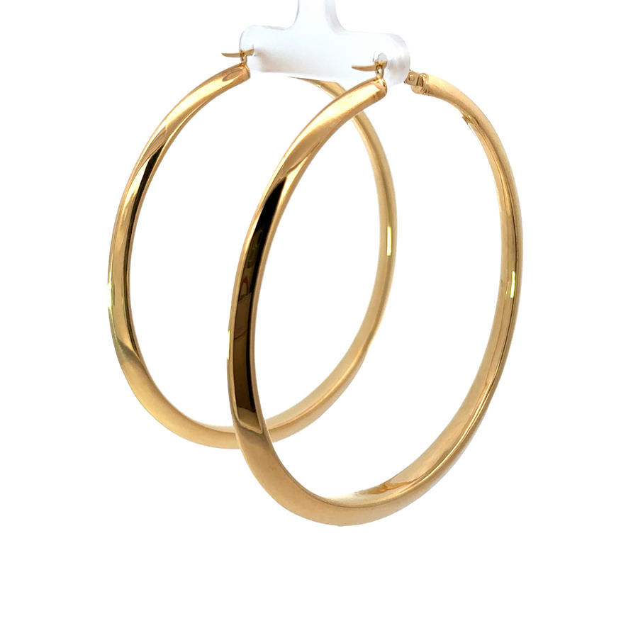 XXL oval earrings styled with formal evening wear