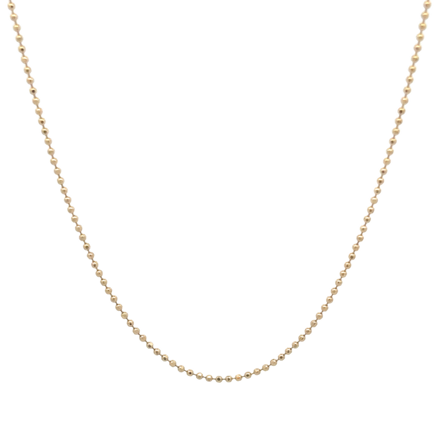 14k gold XXS ball chain necklace laid flat on white background