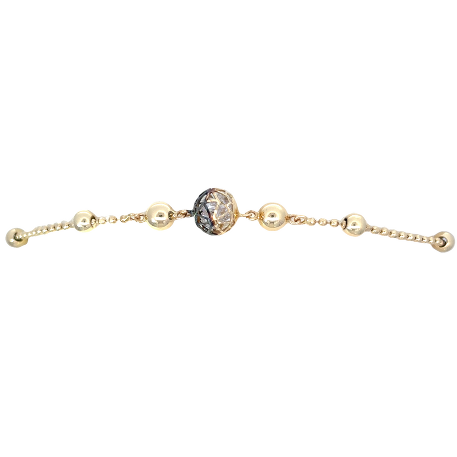 Adjustable 14k gold bracelet featuring dual-tone design